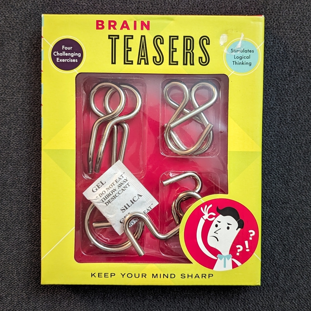 NIB Brain Teasers with 4 Challenging Excercises - Picture 1 of 3